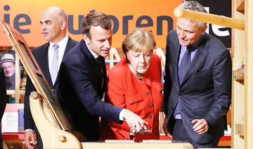 Macron urges Merkel to fight for EU revival