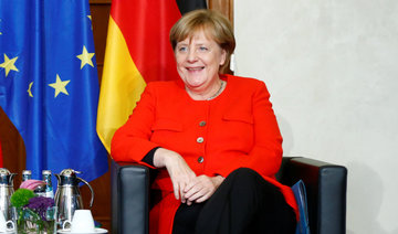 As tricky coalition talks loom, Merkel hopes for regional poll boost