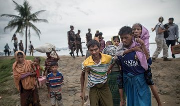 Ten drown as Rohingya boat sinks off Bangladesh, 12,000 more arrive