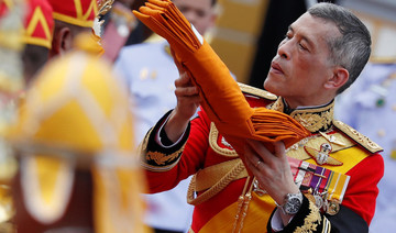 Remains of late Thai king collected after night of tears and ancient funeral rites