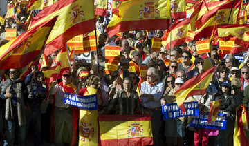 Thousands rally in Madrid, urge jailing of deposed Catalan leader