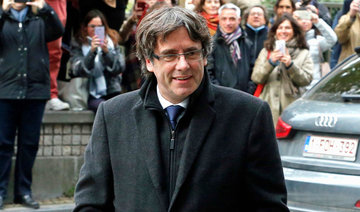 Puigdemont turns himself in to Belgian police