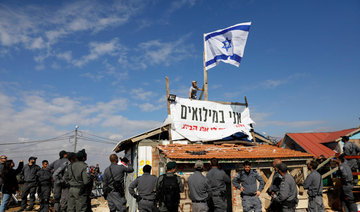 Israeli settlers scuffle with police at West Bank outpost demolition
