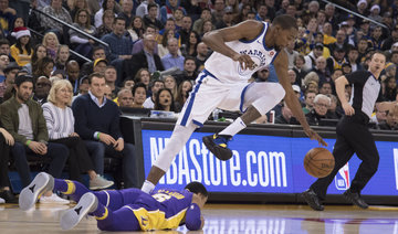 Durant leads Warriors past Lakers for 11th straight win