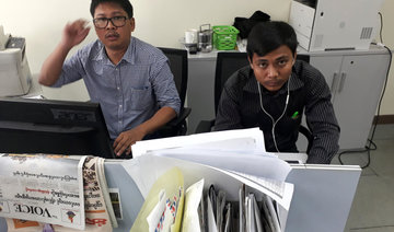 Myanmar court remands Reuters journalists for 2 more weeks