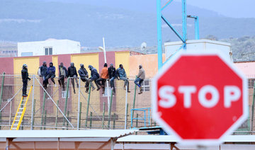 More than 200 migrants storm Morocco-Spain border