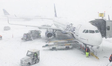 New York airport terminal flooded as brutal cold grips US East Coast