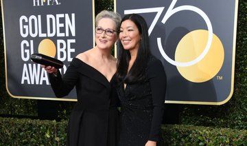 In photos: Golden Globes red carpet transformed by black dress fashion protest