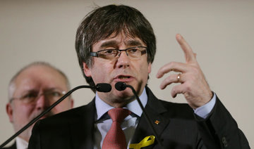 Catalan separatists agree to re-elect ousted president Puigdemont