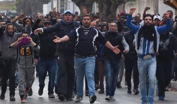 Tunisia arrests 237 as violent protests spread