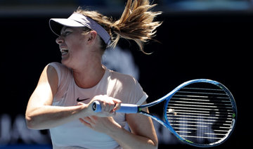 Unseeded Sharapova sails into Open second round