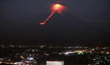 Philippine volcano ‘fireworks’ draw tourists as residents flee