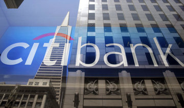 Citigroup reports $18 billion loss on one-time tax items