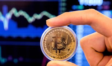 Bitcoin slides to below $10,000 for first time since December