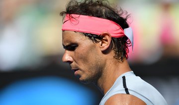 Relieved Rafa Nadal survives test as Caroline Wozniacki turns on style
