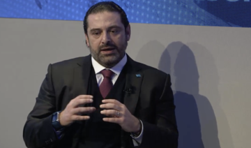 Hariri goes on charm offensive in Davos