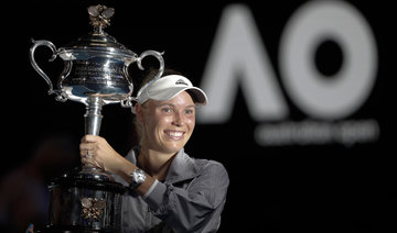 'Emotional' Caroline Wozniacki beats Simona Halep to win first Grand Slam at Australian Open