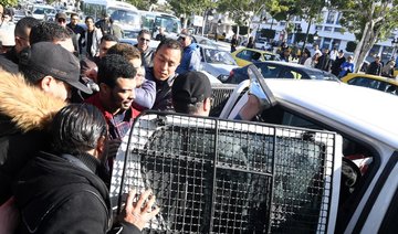 Tunisia police disperse LGBT protesters