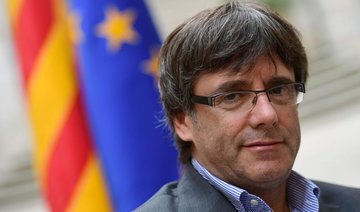Fugitive Catalan chief seeks parliament protection for vote