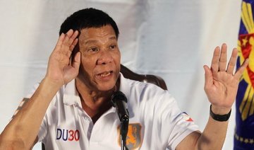 Philippine anti-graft chief defies Duterte suspension order