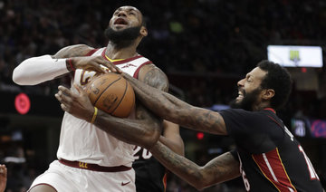 LeBron James, Cavaliers squeeze past Heat