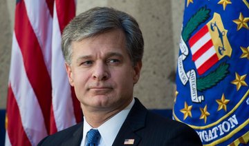 FBI chief Wray tells staff he stands with them after memo made public