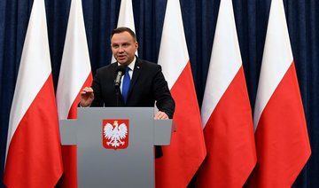 Poland’s president signs controversial Holocaust bill into law