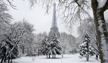Eiffel Tower closed anew as snow, freezing rain pummel France