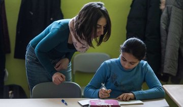 Lesson in endurance: Syrian refugee teacher enters German school