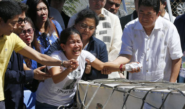 Family grieves Philippine maid found dead in Kuwait freezer