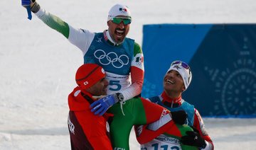 Arab history-maker Samir Azzimani carries fellow skier over line for 'moment of the Games'