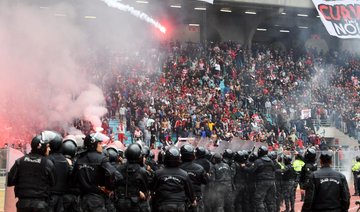 Referee suspended and claims of match fixing after fans riot in Tunisia derby match