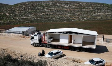 Israel installs homes at first new settlement since 1991