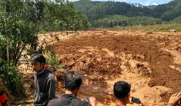 Hillside crashes onto Indonesian farmers; 5 dead, 18 missing
