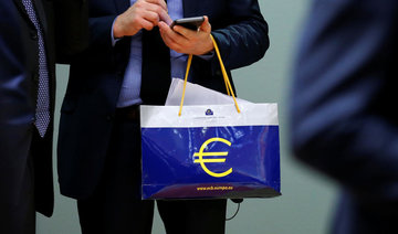 Euro zone inflation falls again despite decade-high growth