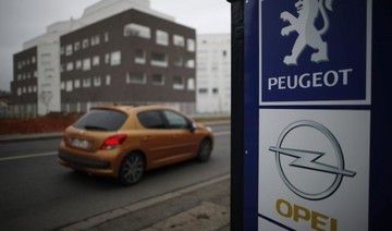 Peugeot hits new earnings record despite Opel loss