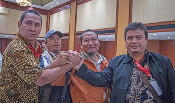 Indonesian ex-terrorists apologize to victims in reconciliation meeting