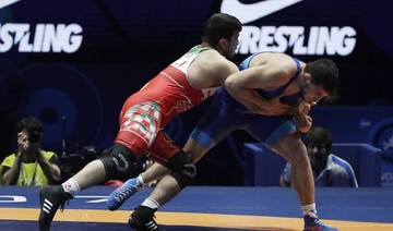 Iran’s former wrestling chief criticizes government