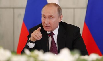 Putin appeals to ‘love of fatherland’ to get Russians to polls