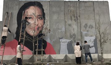Afghan street artists haunt warlords with graffiti campaign