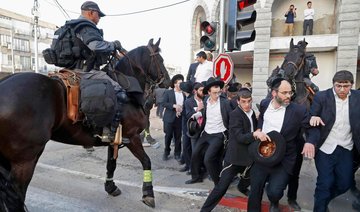 Israeli police arrest ultra-Orthodox Jews in draft protest