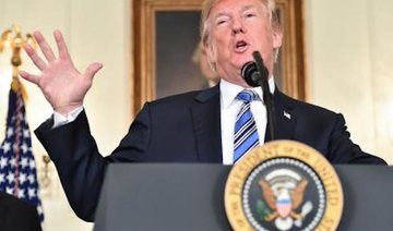 Trump signs $1.3 trillion budget after threatening veto