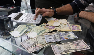 Iran currency hits record low, crashing through 50,000 mark