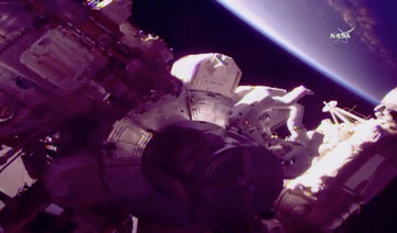 NASA astronauts go spacewalking days after reaching orbit