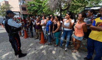 Sixty eight killed in Venezuelan police station riot and fire