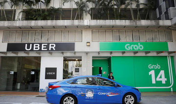 Singapore watchdog says Uber-Grab deal may have infringed competition
