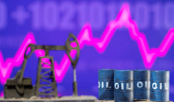 Models of oil barrels and a pump jack are displayed in front of a rising stock graph and "$100" in this illustration taken February 24, 2022. (REUTERS)