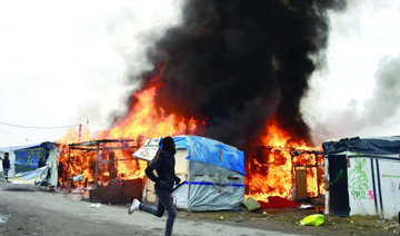 Fire breaks out in Calais ‘Jungle’ camp as demolition ramps up