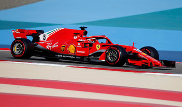 Sebastian Vettel takes pole position for Bahrain GP ahead of Ferrari teammate Kimi Raikkonen