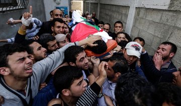 Palestinians bury their dead in Gaza, Israel kills nine in border clashes Saturday